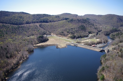 Aerial view of the Yankee Rowe site after decommissioning; the natural environment has been restored and the 2-acre ISFSI is nestled between the trees at the base of the hill